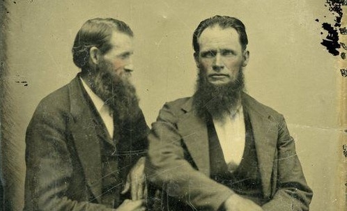 two vintage gentlemen with long beards portrait