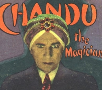 Chandu the magician wearing goofy hat.
