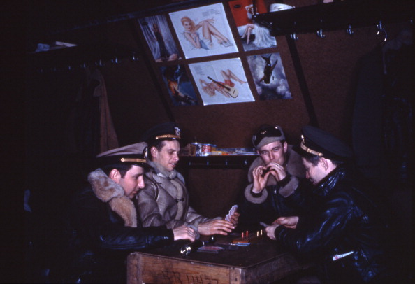 Vintage military men playing cribbage.